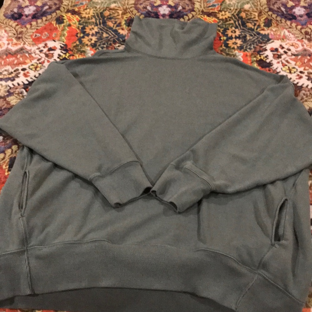 Oversized, cowl neck sweatshirt.